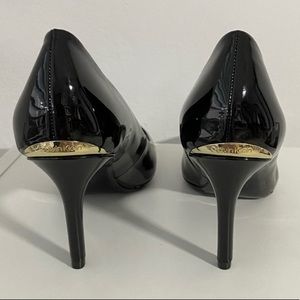 Calvin Klein. Black Kamara Patent Leather Pumps. New w/box. Never worn. Size 7.5